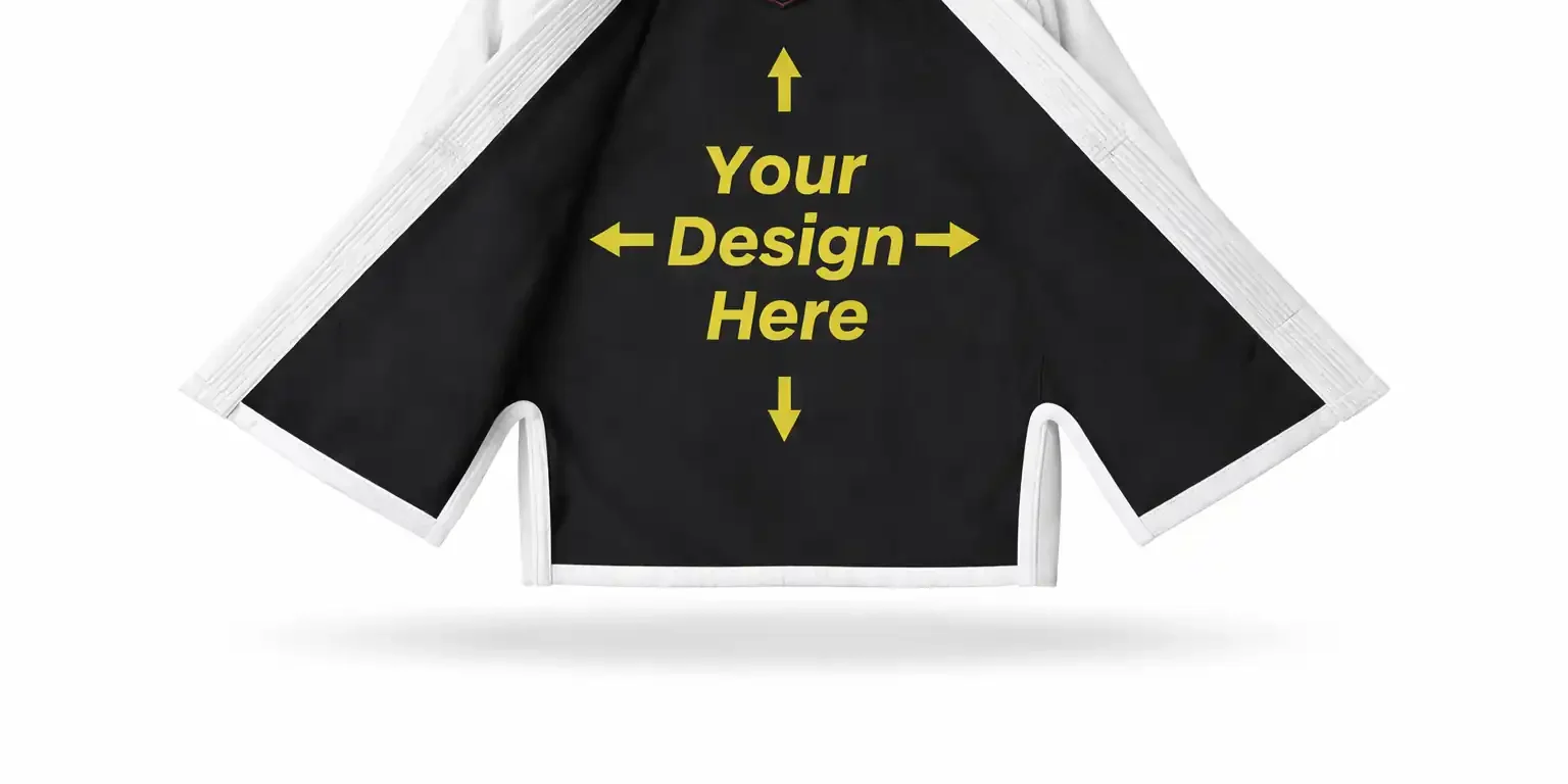 The inner lining of a customizable white Brazilian Jiu-Jitsu gi with the text "Your Design Here" in bright yellow, surrounded by directional arrows for personalization.