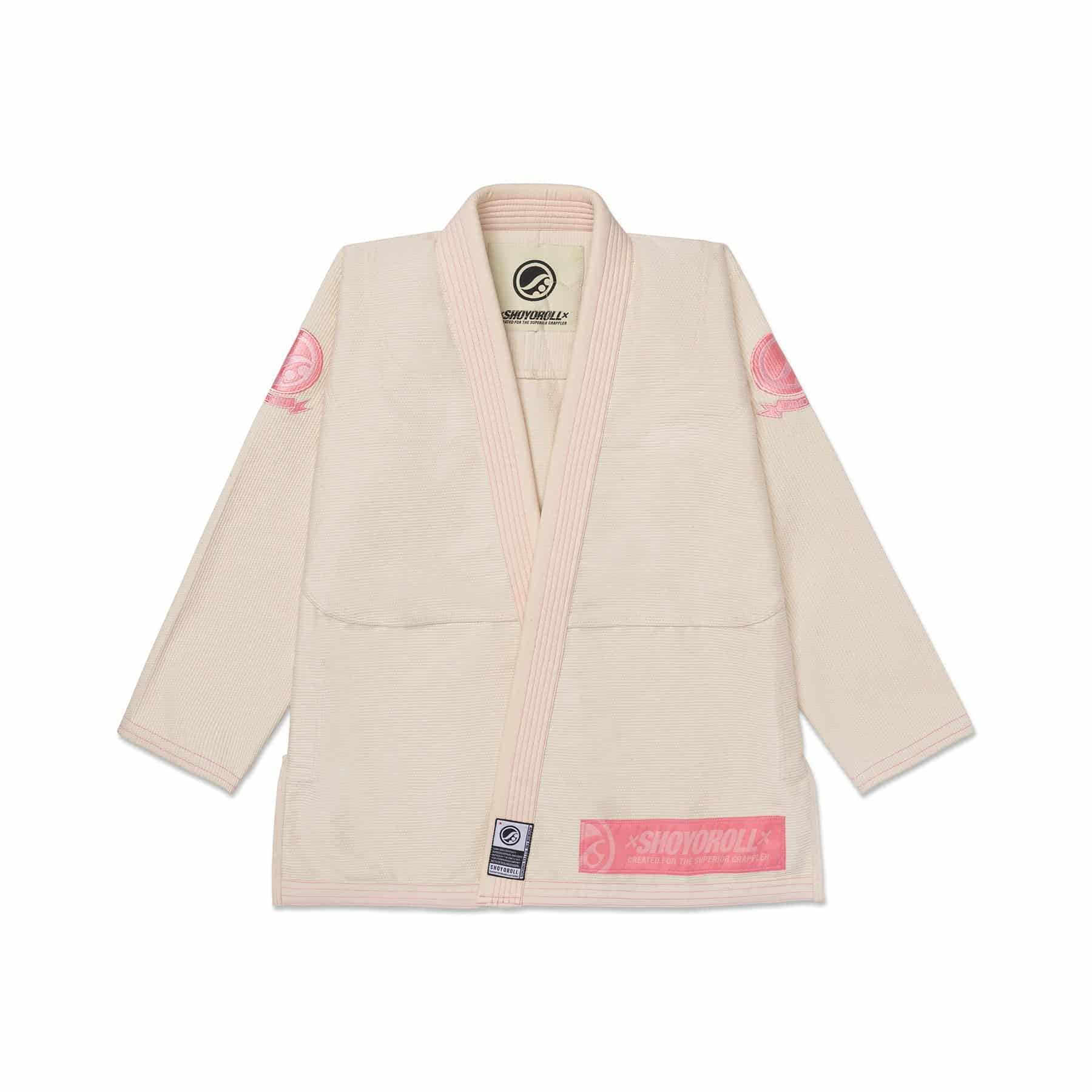 Alternate front angle of Roz Competitor Unbleached jacket showing balanced drape and chest artwork