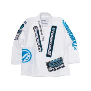 Full front image of the 24 Federation kimono showing true-blue sleeve embroidery, CHOQUE chest patches, and the left-side strip.