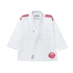 Shoyoroll Crimson Competitor White jacket front view with deep red details and competitor model signature cut Front view of Shoyoroll Crimson Competitor White jacket showing competitor silhouette and deep red patch design