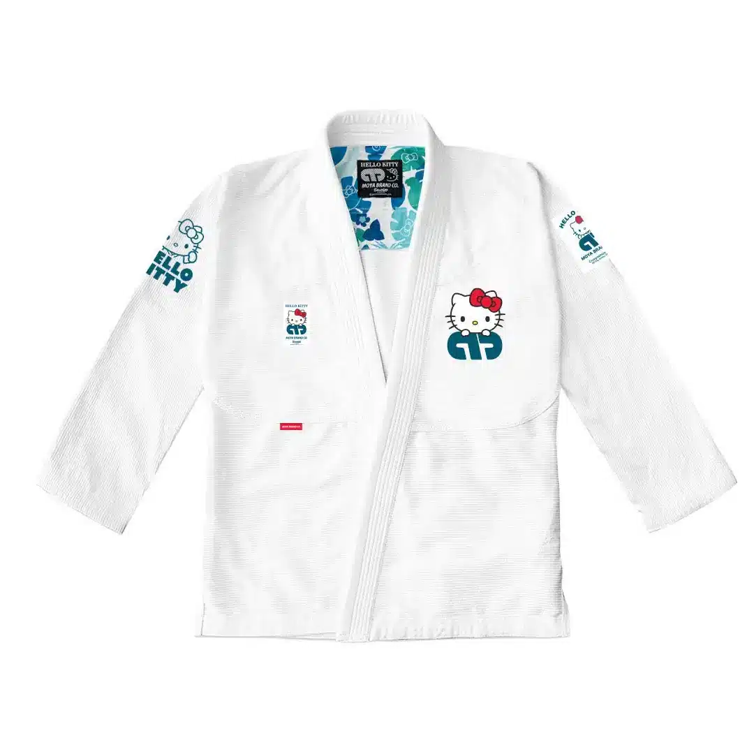 White Moya Hello Kitty BJJ gi jacket front view showing detailed Hello Kitty graphics stitched patches and premium material